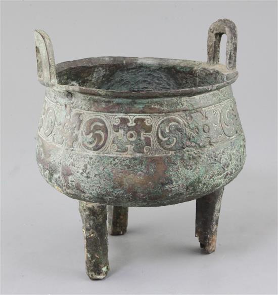 A Chinese archaic bronze tripod ritual food vessel, Ding, Western Zhou dynasty, 11th - 8th century BC, 22cm high, slight faults